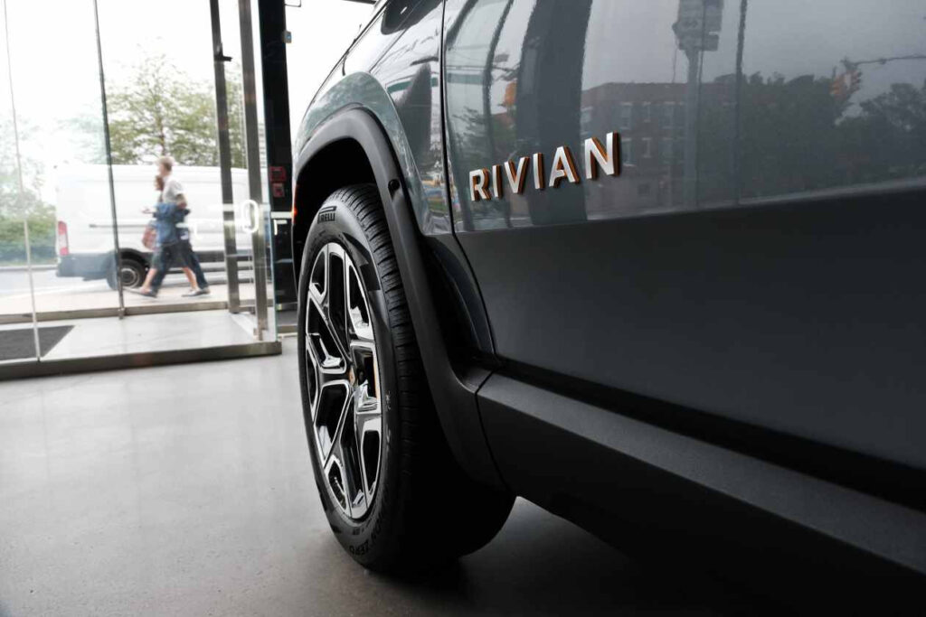 Rivian to Cut 600+ Jobs in Latest Layoff as EV Market Cools